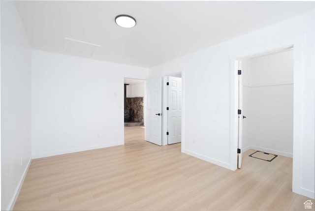 3189 S 4000 W, Roosevelt, UT 84066 - spare room with light wood-style flooring and attic access