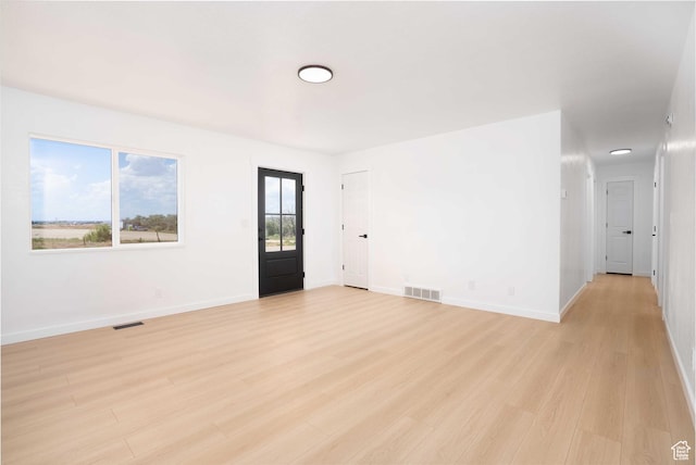 3189 S 4000 W, Roosevelt, UT 84066 - spare room with light wood-style floors and baseboards