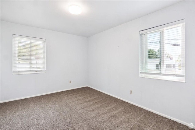 2684 E 2900 S, Millcreek, UT 84109 - spare room with plenty of natural light and carpet flooring