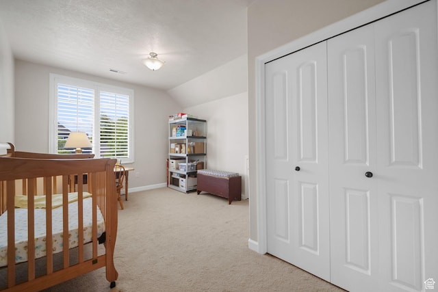 10693 S Vermillion Dr, South Jordan, UT 84009 - bedroom featuring carpet flooring, a closet, and vaulted ceiling