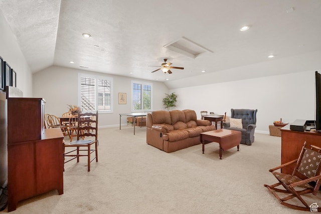 10693 S Vermillion Dr, South Jordan, UT 84009 - living room featuring vaulted ceiling, recessed lighting, and light carpet
