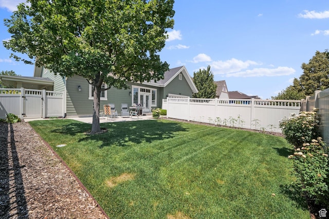 10693 S Vermillion Dr, South Jordan, UT 84009 - fenced backyard featuring a gate and a patio area