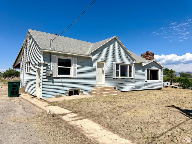 3060 S 2500 E, Vernal, UT 84078 - view of front of property with a chimney and roof with shingles