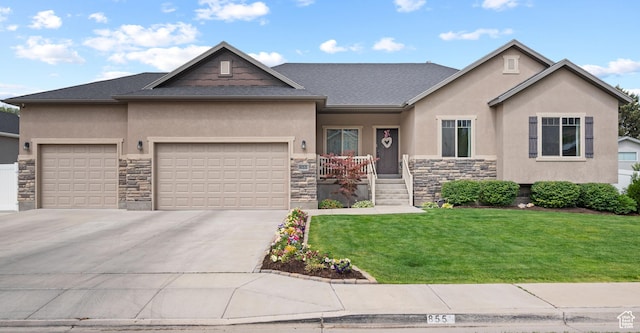 855 N 1220 W, Pleasant Grove, UT 84062 - view of front of house with stone siding, stucco siding, a garage, and a front yard