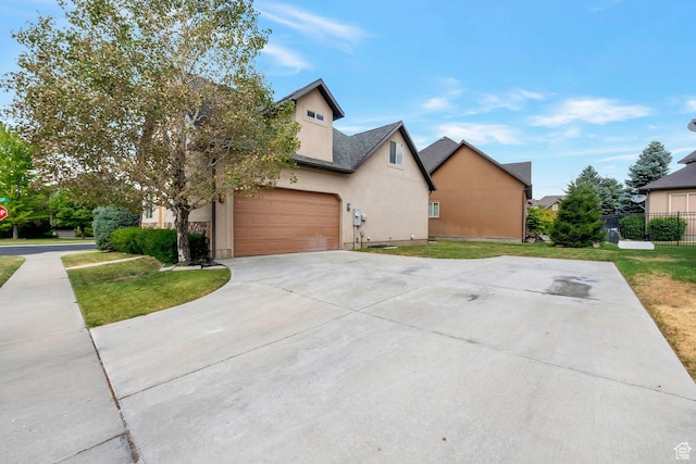 4018 W Cypress, Cedar Hills, UT 84062 - view of front of home featuring concrete driveway, a garage, and stucco siding