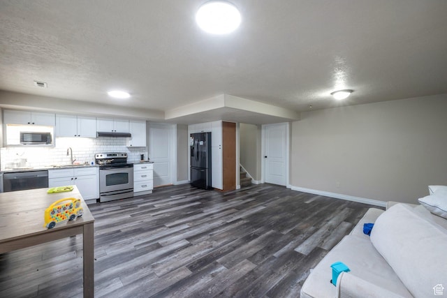4018 W Cypress, Cedar Hills, UT 84062 - kitchen featuring appliances with stainless steel finishes, under cabinet range hood, a textured ceiling, dark wood-type flooring, and open floor plan