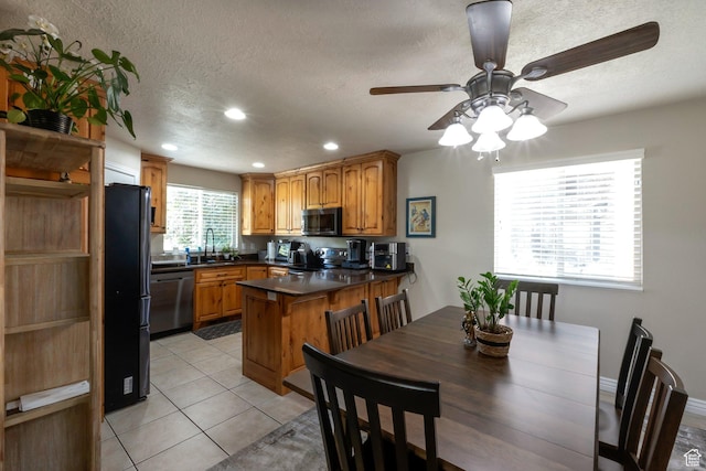 4018 W Cypress, Cedar Hills, UT 84062 - dining space featuring ceiling fan, a textured ceiling, recessed lighting, and light tile patterned floors