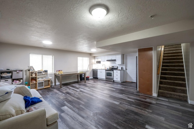 4018 W Cypress, Cedar Hills, UT 84062 - living area featuring a textured ceiling, dark wood-style flooring, stairway, and recessed lighting