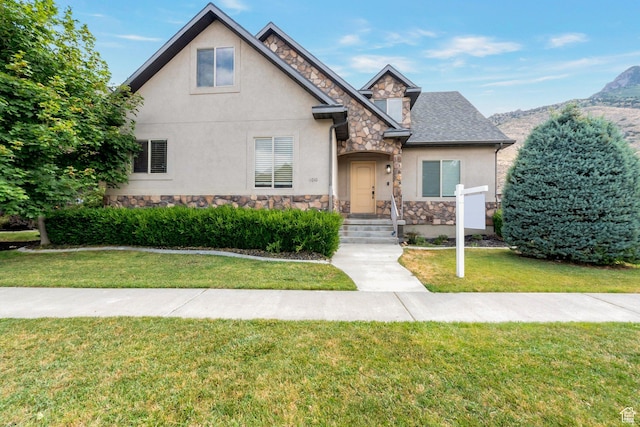 4018 W Cypress, Cedar Hills, UT 84062 - view of front of house with stone siding, stucco siding, a front lawn, and roof with shingles
