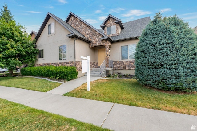 4018 W Cypress, Cedar Hills, UT 84062 - view of front facade featuring stone siding, stucco siding, and a front lawn