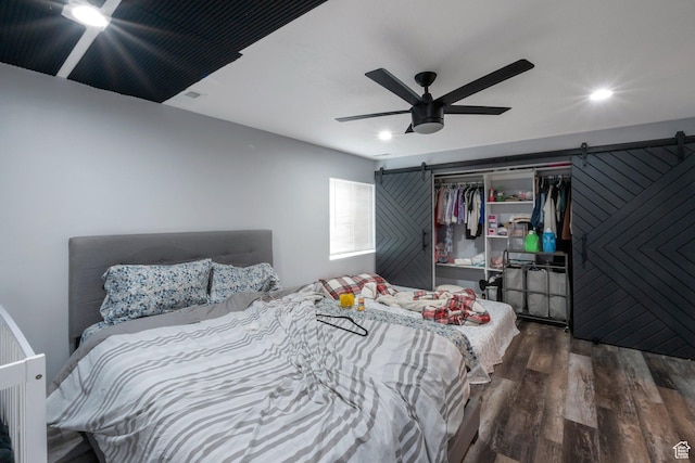 4018 W Cypress, Cedar Hills, UT 84062 - bedroom featuring a barn door, wood finished floors, recessed lighting, a closet, and ceiling fan