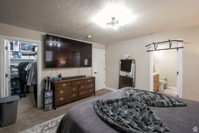 4018 W Cypress, Cedar Hills, UT 84062 - carpeted bedroom featuring a spacious closet, a textured ceiling, a closet, and ensuite bathroom