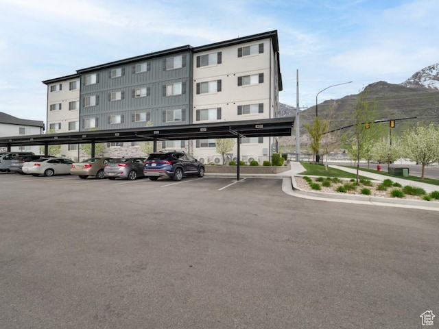 1141 E 1320 S Unit A401, Provo, UT 84606 - view of property with covered parking and a mountain view