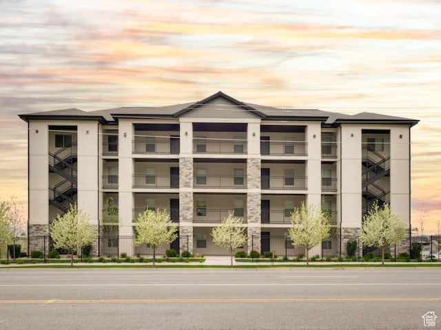 1141 E 1320 S Unit A401, Provo, UT 84606 - property at dusk with a view of apartment building / complex