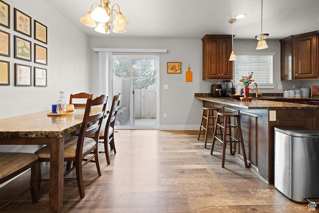 2501 W 1100 N, Provo, UT 84604 - dining room featuring plenty of natural light, a chandelier, and light wood finished floors
