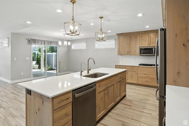 1470 N Cobblewood Ct, Kaysville, UT 84037 - kitchen featuring stainless steel appliances, recessed lighting, a center island with sink, light countertops, and pendant lighting