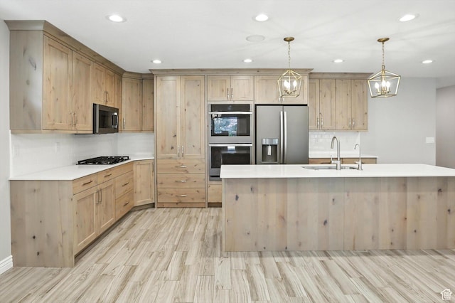1470 N Cobblewood Ct, Kaysville, UT 84037 - kitchen featuring stainless steel appliances, light brown cabinets, decorative backsplash, light wood-type flooring, and recessed lighting