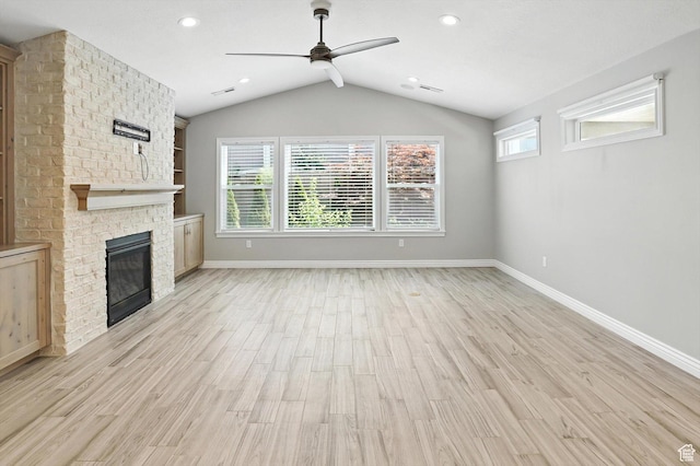 1470 N Cobblewood Ct, Kaysville, UT 84037 - unfurnished living room with a ceiling fan, vaulted ceiling, light wood finished floors, a brick fireplace, and recessed lighting