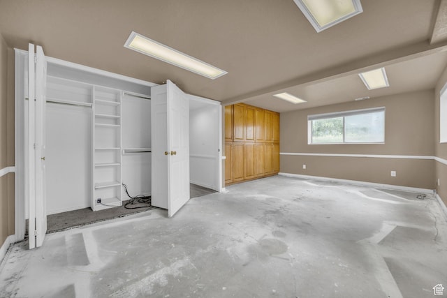 5350 S 3450 W, Roy, UT 84067 - unfurnished bedroom featuring unfinished concrete floors and baseboards