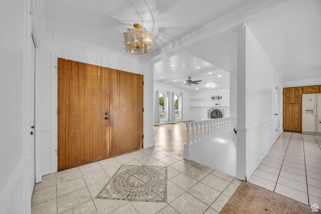 5350 S 3450 W, Roy, UT 84067 - foyer featuring light tile patterned flooring, a chandelier, a brick fireplace, recessed lighting, and ceiling fan