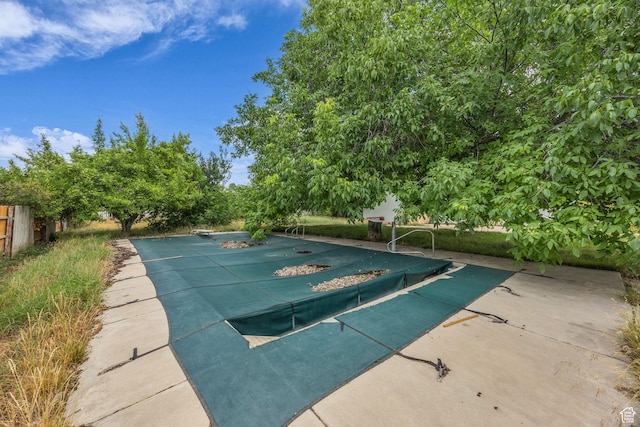 5350 S 3450 W, Roy, UT 84067 - view of swimming pool with a diving board, a covered pool, and a patio