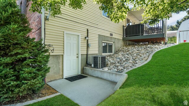 1138 Briggs Dr, Bountiful, UT 84010 - view of exterior entry with a yard