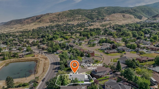 1138 Briggs Dr, Bountiful, UT 84010 - aerial overview of property's location featuring nearby suburban area, property parcel outlined, and a water and mountain view