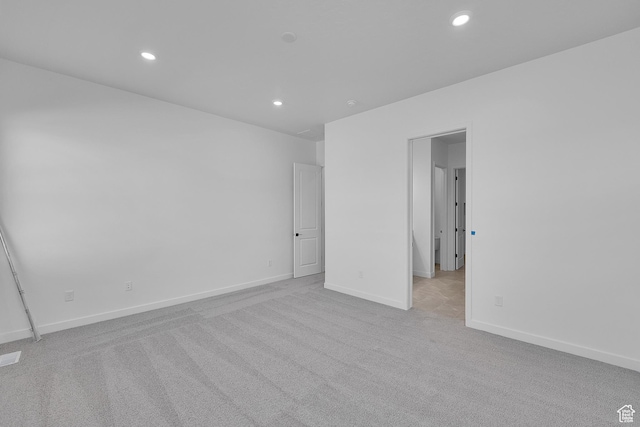 1086 S 3170 E Unit 217, Spanish Fork, UT 84660 - empty room with light colored carpet and recessed lighting