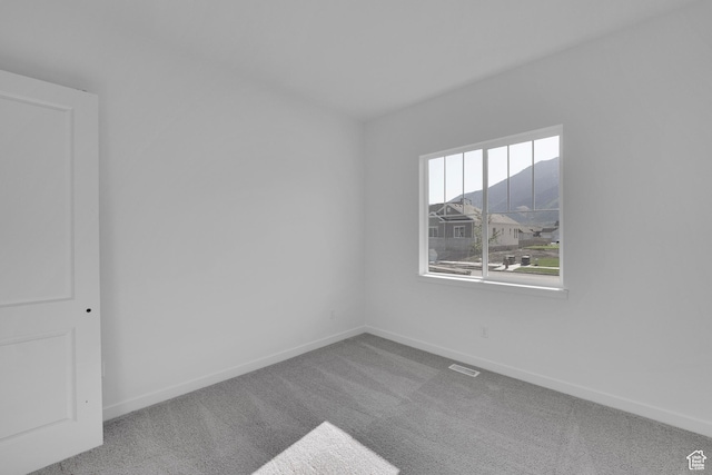1086 S 3170 E Unit 217, Spanish Fork, UT 84660 - carpeted spare room featuring baseboards