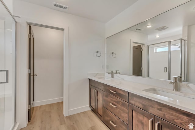 1352 N 1440 E Unit 21, Payson, UT 84651 - full bath with wood finished floors, double vanity, and a stall shower