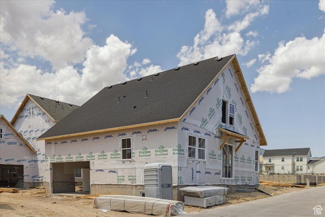 6782 W Docksider Dr Unit 302, South Jordan, UT 84009 - view of front of property featuring roof with shingles and stucco siding