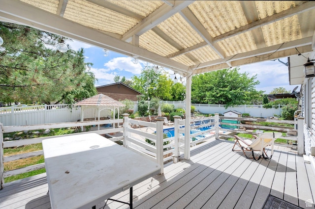1481 W Bluemont Dr, Murray, UT 84123 - wooden deck featuring a fenced backyard and outdoor dining area