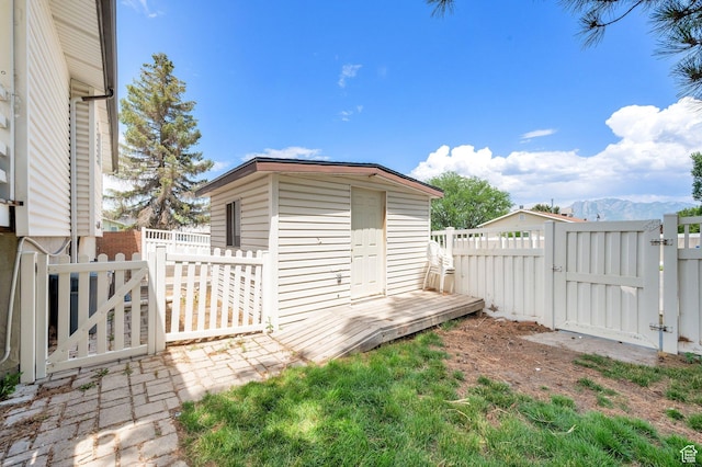 1481 W Bluemont Dr, Murray, UT 84123 - fenced backyard with a gate and an outdoor structure