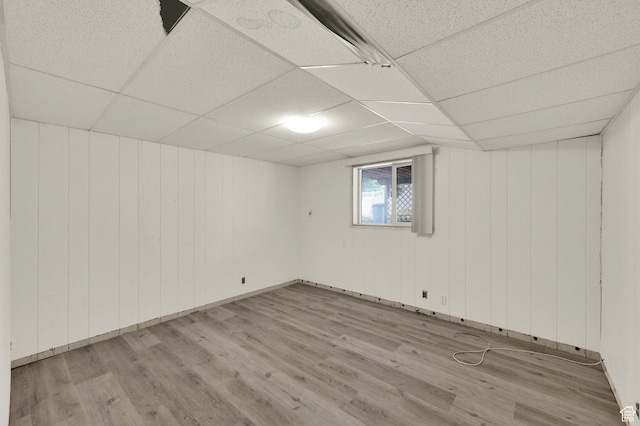 1481 W Bluemont Dr, Murray, UT 84123 - below grade area with wood finished floors, a paneled ceiling, and wood walls