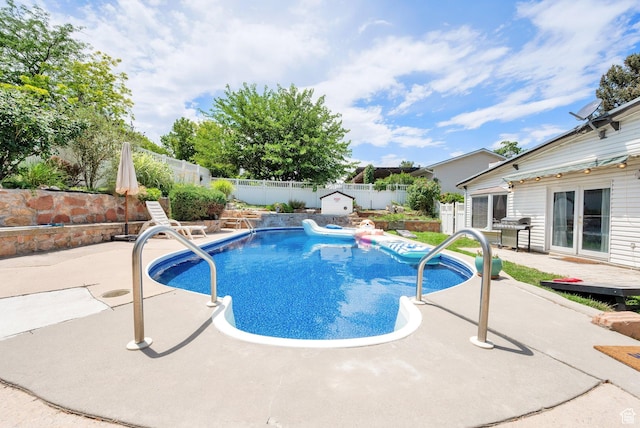 1481 W Bluemont Dr, Murray, UT 84123 - view of swimming pool featuring a fenced backyard, grilling area, a patio, and french doors