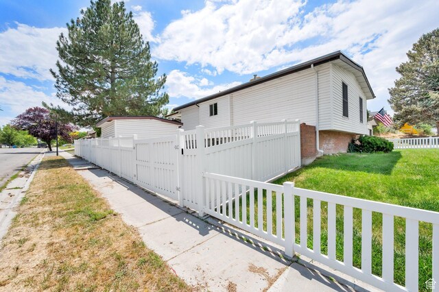 1481 W Bluemont Dr, Murray, UT 84123 - view of side of home featuring a gate
