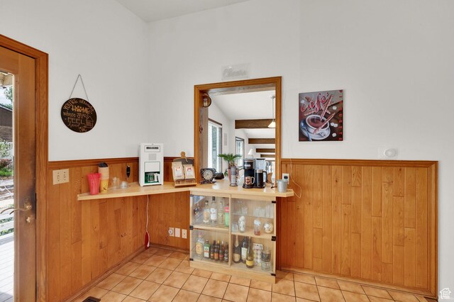 1481 W Bluemont Dr, Murray, UT 84123 - bar area featuring a wainscoted wall, wood walls, and light tile patterned flooring