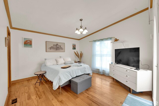 1481 W Bluemont Dr, Murray, UT 84123 - bedroom featuring ornamental molding, vaulted ceiling, a chandelier, and light wood-style floors