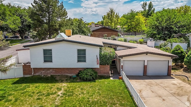 1481 W Bluemont Dr, Murray, UT 84123 - view of front facade featuring brick siding, concrete driveway, and an attached garage