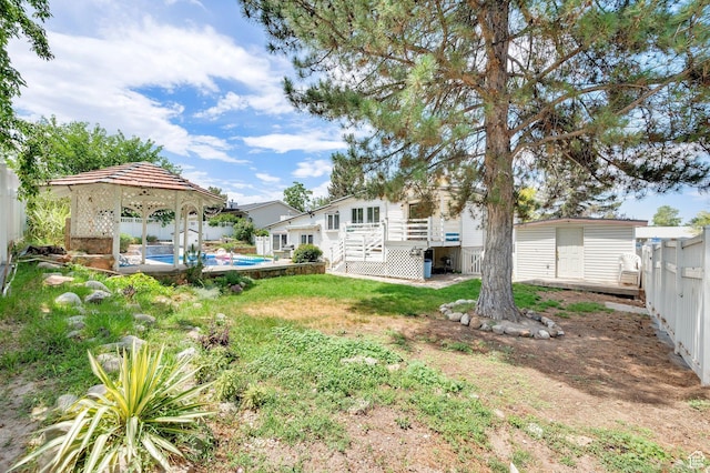1481 W Bluemont Dr, Murray, UT 84123 - view of yard with a gazebo, a deck, and a shed