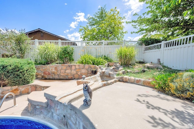 1481 W Bluemont Dr, Murray, UT 84123 - fenced backyard with a patio area