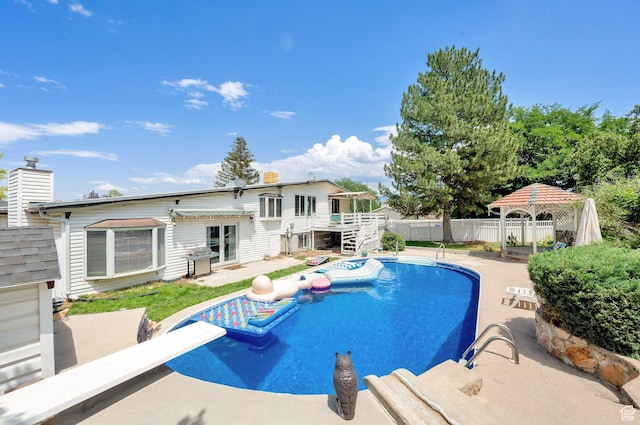 1481 W Bluemont Dr, Murray, UT 84123 - view of swimming pool with a fenced backyard, a gazebo, area for grilling, and a patio