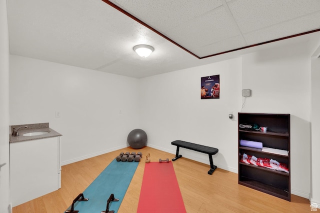 1481 W Bluemont Dr, Murray, UT 84123 - exercise area featuring a sink and wood finished floors