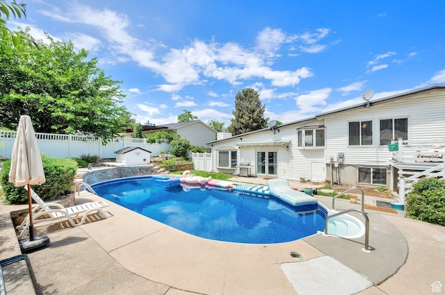 1481 W Bluemont Dr, Murray, UT 84123 - view of swimming pool with french doors, a fenced backyard, and a patio