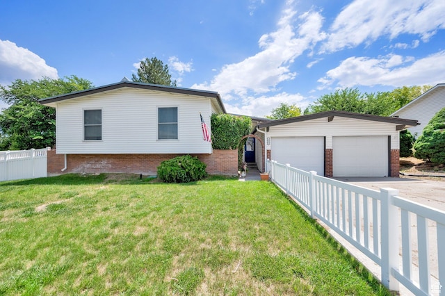 1481 W Bluemont Dr, Murray, UT 84123 - view of side of home with a garage, concrete driveway, an outbuilding, and brick siding