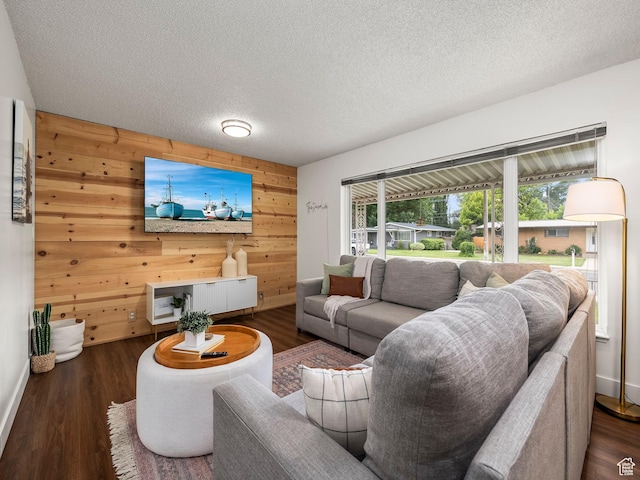 155 S 300 W, Spanish Fork, UT 84660 - living area with wooden walls, wood finished floors, and a textured ceiling