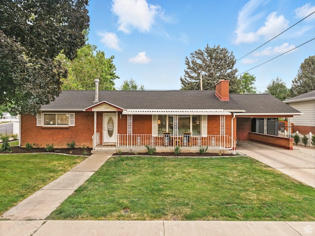 155 S 300 W, Spanish Fork, UT 84660 - ranch-style home with brick siding, a porch, driveway, a front lawn, and an attached carport