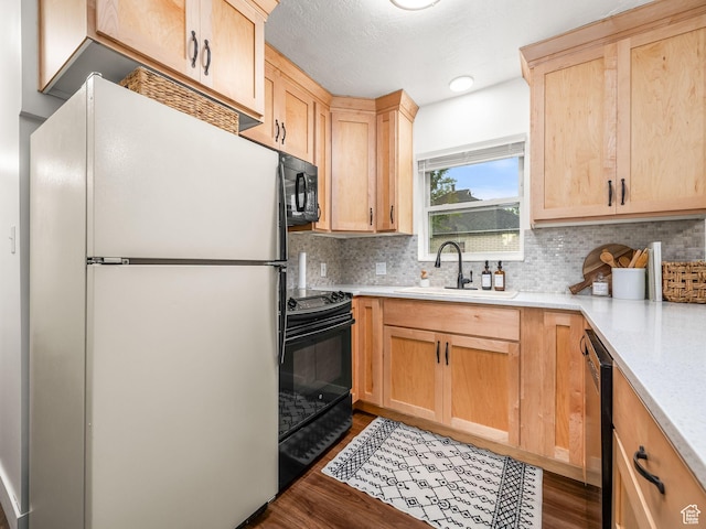 155 S 300 W, Spanish Fork, UT 84660 - kitchen with black appliances, light brown cabinetry, and dark wood finished floors