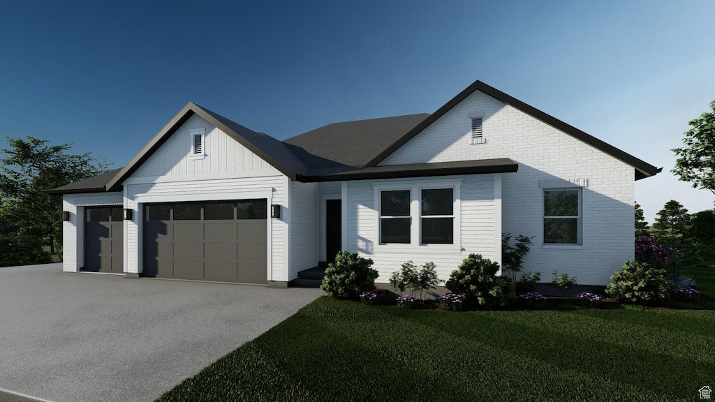 444 E 1600 S Unit 1, Orem, UT 84058 - modern inspired farmhouse with an attached garage, driveway, a front lawn, and board and batten siding