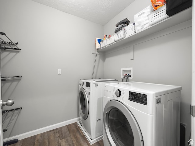 1493 N Sunset Dr, Spanish Fork, UT 84660 - laundry area featuring washing machine and dryer, dark wood-style flooring, and a textured ceiling